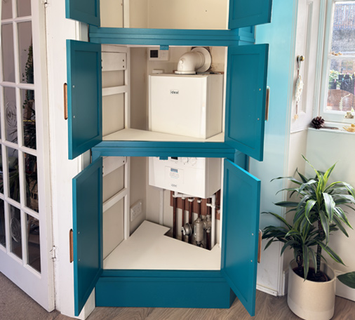 Open doors of the handmade pantry / boiler cupboard